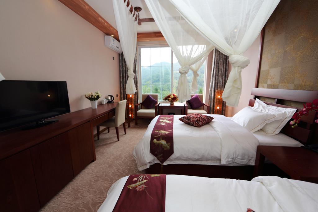 Panshan Tingquan Tuwo Holiday Resort Leshan Rom bilde